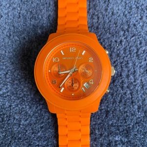 Micheal Kors rubber watch ( never worn )